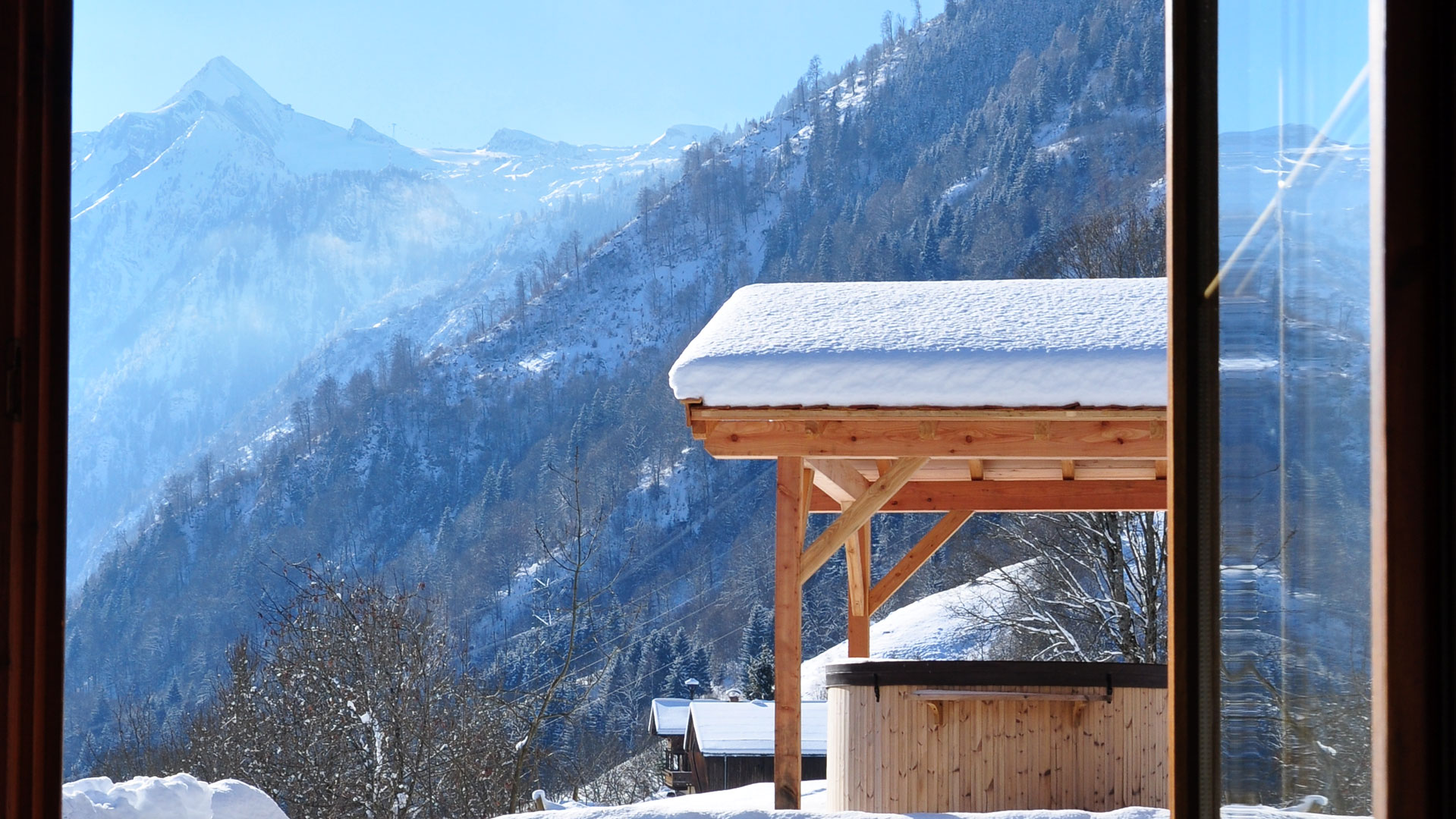 Hottub mit Blick auf das Kitzsteinhorn Apartment Großglockner in Kaprun